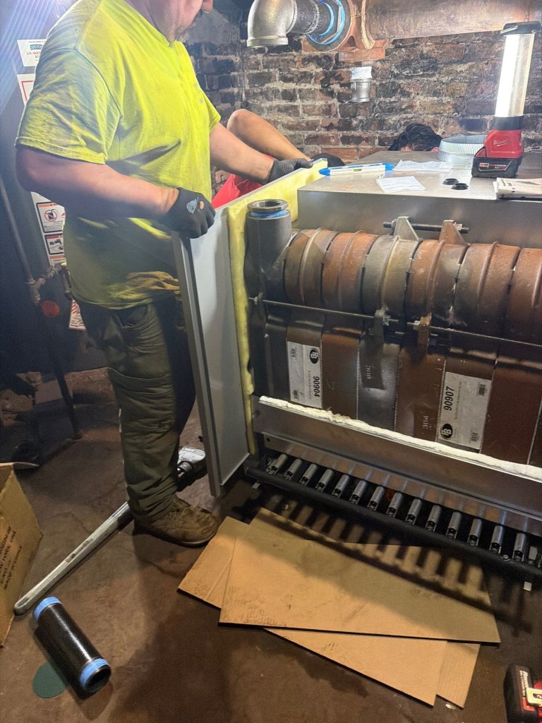 MMDS crew installing a new Peerless steam boiler