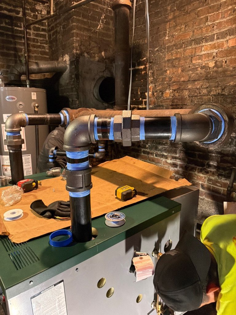 New black iron near-boiler piping on the Peerless steam boiler